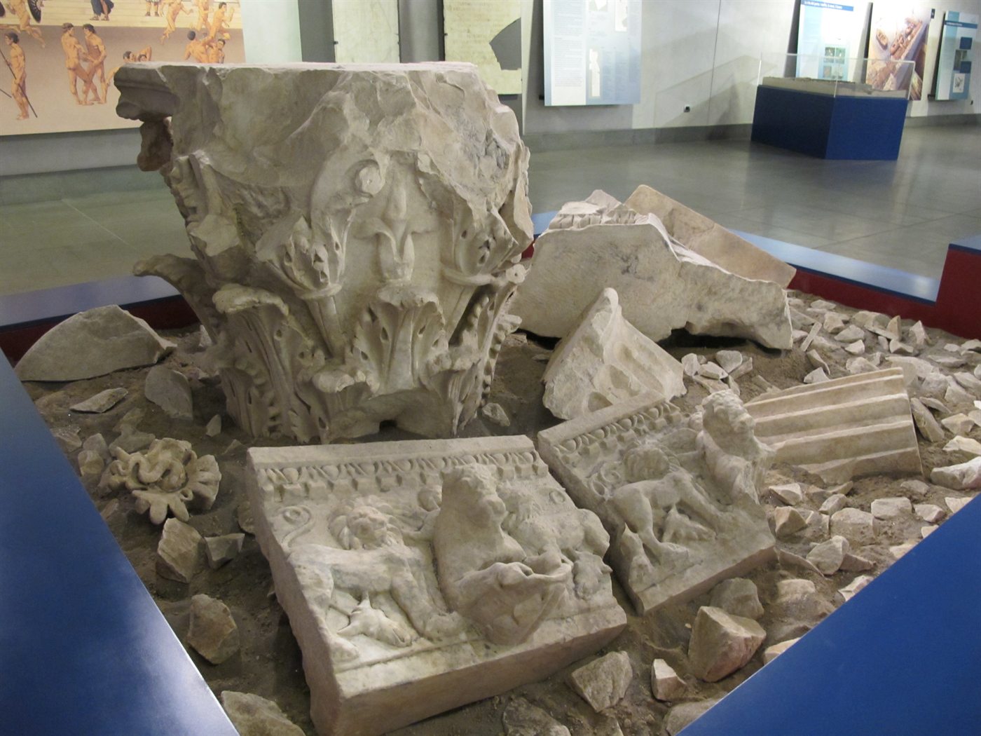 Real archaeological marble fragments recovered during Naples Metro Line 1 works and displayed at Stazione Neapolis