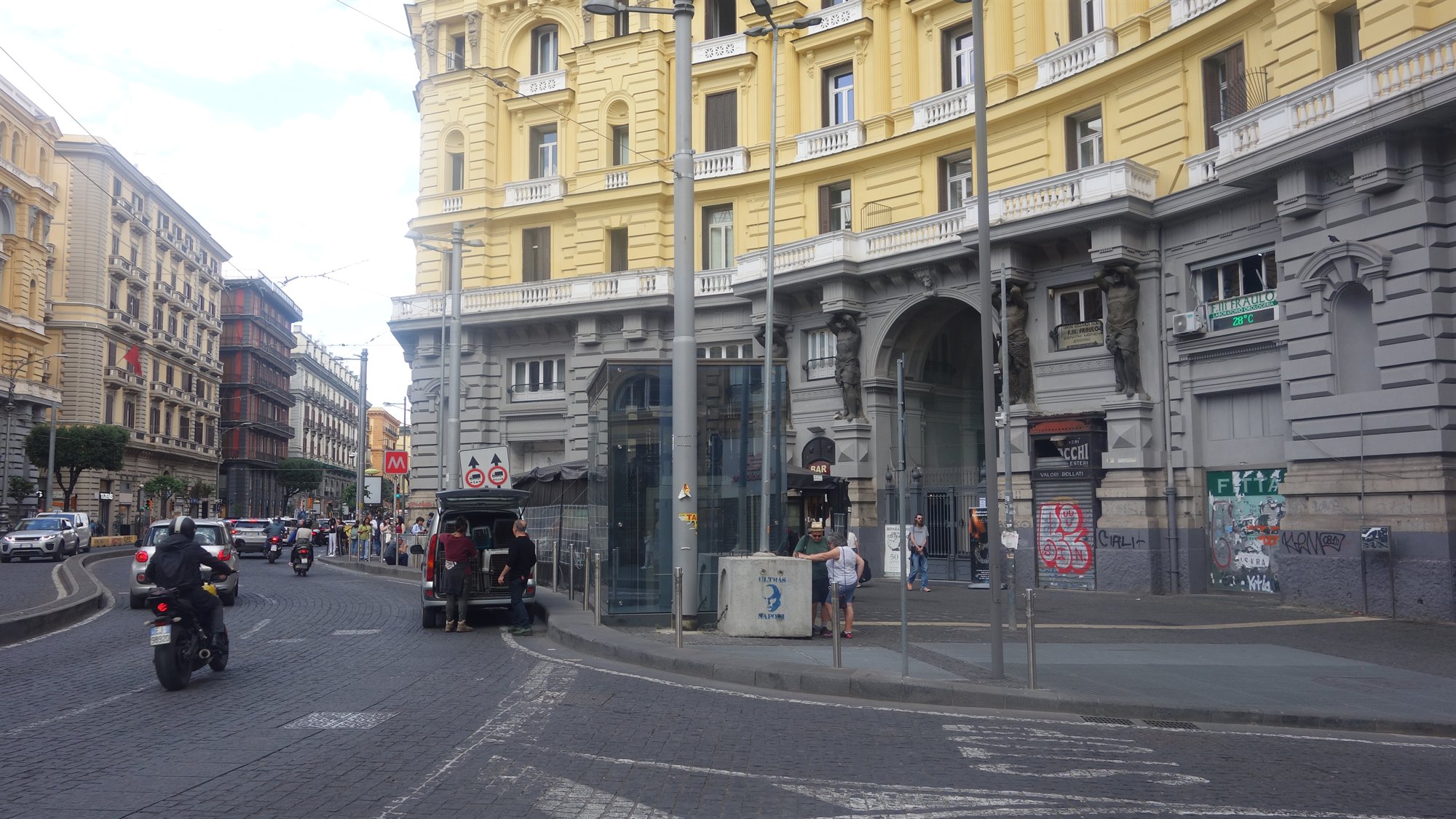 Real 2024 photograph of the Duomo Metro entrance beside Palazzo Nanà
